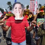 Thousands rally in Philippines, demanding Marcos resign over graft scandal 