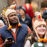In the US, the Macy’s Thanksgiving Day Parade marches on despite high winds
