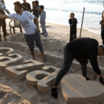 Palestinian sculptors create art on Gaza beach sand to escape Israel’s war 