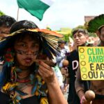 Thousands march for climate action outside COP30 summit in Brazil