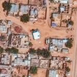 Where are tens of thousands of people in Sudan fleeing to?