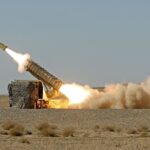 What are the consequences of an escalating global arms race?