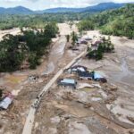 ‘I decided I’d die’: Indonesia’s flood victims recount stories of survival 