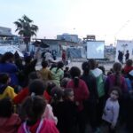 Makeshift movie screenings in Gaza City bring children ‘out of the ruin’ 