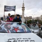 With flags and fireworks, Syrians celebrate one year since fall of al-Assad